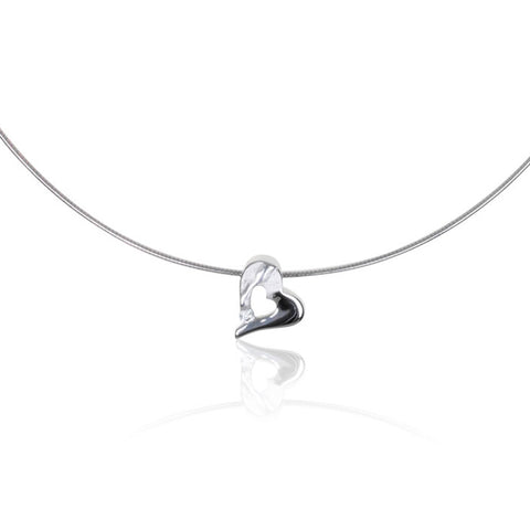 Heart-shaped pendant shown on a silver choker. Shown with shadow.
