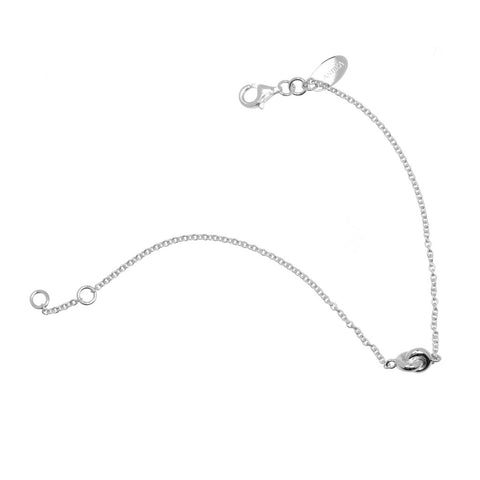 Adeline bracelet - a fine sterling silver chain bracelet with small central silver feature, 17.5cm long with extension.
