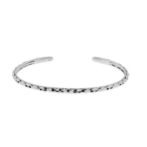 Charlotte bangle is a very fine, sterling silver cuff bangle suitable for a small wrist, 57mm inner diameter.