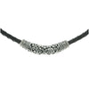 Kelly necklace has an intricately carved sterling silver bead on a woven black vinyl choker, 42cm long.