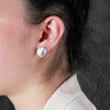 Sterling silver 14mm round stud earrings from Antika. Textured finish. Made in Germany.