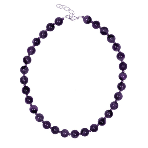 Round amethyst stones with amethyst coloured glass bead spacers, 40cm long with extension chain in sterling silver, by ANTIKA.
