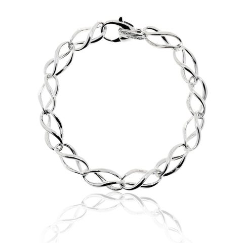 Magnificently crafted, the unique Gianna Bracelet from Antika with twelve sterling silver twisted links with decorative feature on clasp.  Wear with the matching necklace. The silver has a protective layer of white rhodium. 19cm long and the links are 17mm long x 8mm wide. Has a good weight at approximately 16.5 grams.