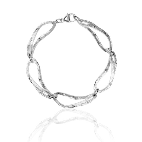 Magnificently crafted sterling silver bracelet from Antika with flame-shaped open links in textured, matt finish.  Wear with matching choker necklace.  The bracelet is rhodium plated to protect against tarnishing. The Marialena is 19cm long and the links are 35mm x 12mm wide. Made in Germany.