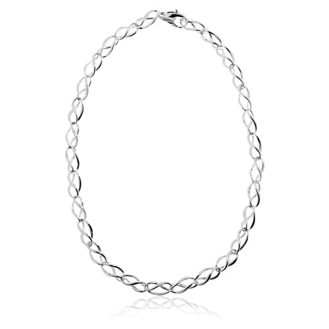Magnificently crafted, the unique Gianna Necklace from Antika with twisted sterling silver  links with decorative feature on clasp.  The silver has a protective layer of white rhodium. 45cm long and the links are 17mm long x 8mm wide.
