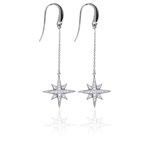 Long drop sterling silver earrings from ANTIKA, with stars containing white cubic zirconia stones, 59mm long.