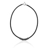 Kelly necklace from ANTIKA, has an intricately carved sterling silver bead on a woven black vinyl choker, 42cm long.