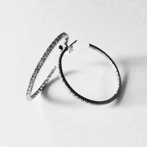Sterling silver hoop earrings 39mm in diameter, with crystals on the front face of the earrings and down back of the inside face.