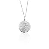Round, sterling silver pendant with a textured matt finish with a shell fossil (or ammonite) imprint, 20cm in diameter.