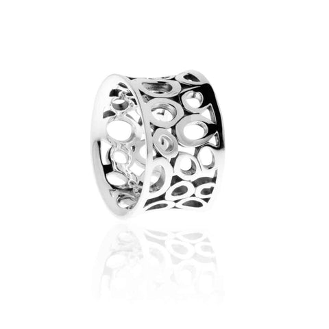 Groovy ring has oval cut-outs of various sizes carved from sterling silver. Lightly convex, comfort fit. 13mm wide.