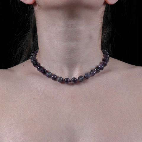Amethyst beaded necklace from Antika, 40cm long shown on model.