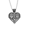 Giselle pendant is heart-shaped, ornate, floral design in sterling silver featuring a similarly ornate bale.