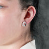 Sterling silver earring studs in textured matt and high polish finiah, from Antika. 13mm in diameter. Made in Germany.