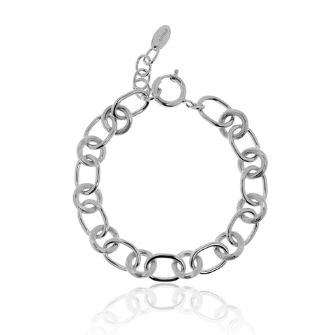 Unique and beautifully crafted sterling silver bracelet from Antika. Alternating textured round and smoothly polished oval links comprises this 19cm long bracelet.  Each link is complete - without joins. Has a 2.5cm sterling silver extension chain.