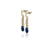 Gold plated sterling silver and lapis lazuli earrings featuring a free hanging shell fossil imprint. Stud fitting concealed. From Antika. Side view.