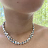 Choker necklace with two twisted strands of freshwater pearls and pale blue glass beads. Shown on model.